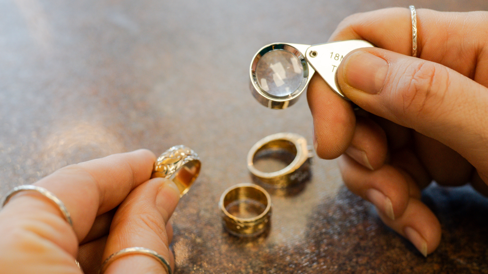 Jewellery and Jewellers Loupe Looking at jewellery through a jewellers loupe